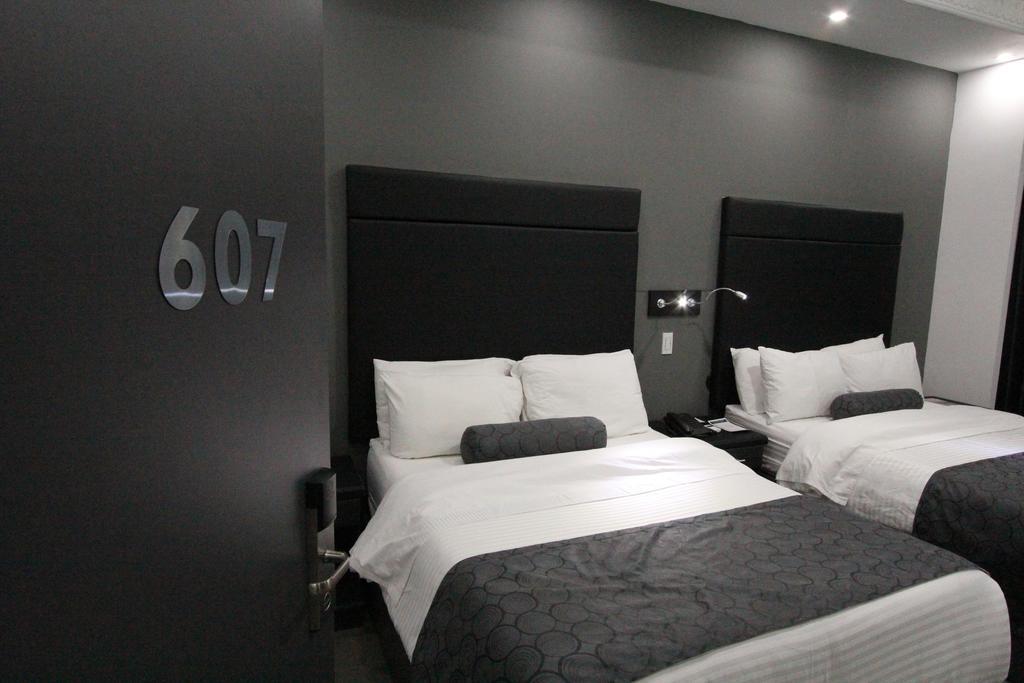 Habitación Doble Deluxe - 2 camas dobles